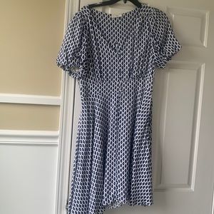 Really cute fit and flare dress.  Size medium. The bust is a little big.